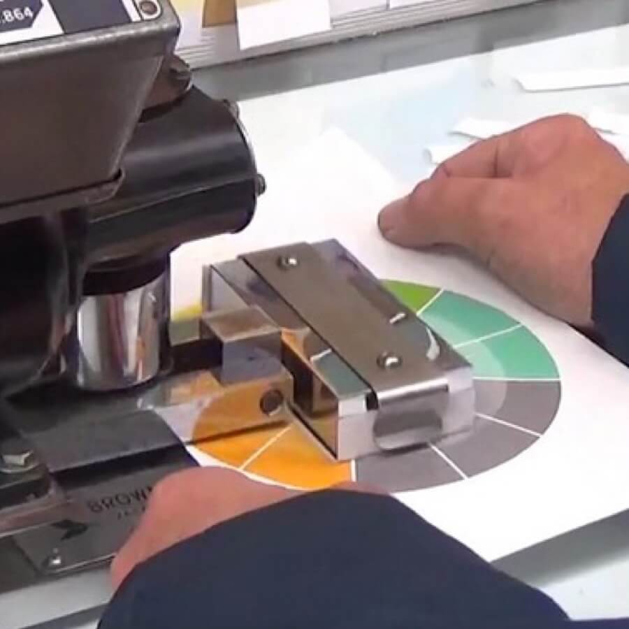 Spectrum Packaging Man Testing Packaging Surface Thumbnail